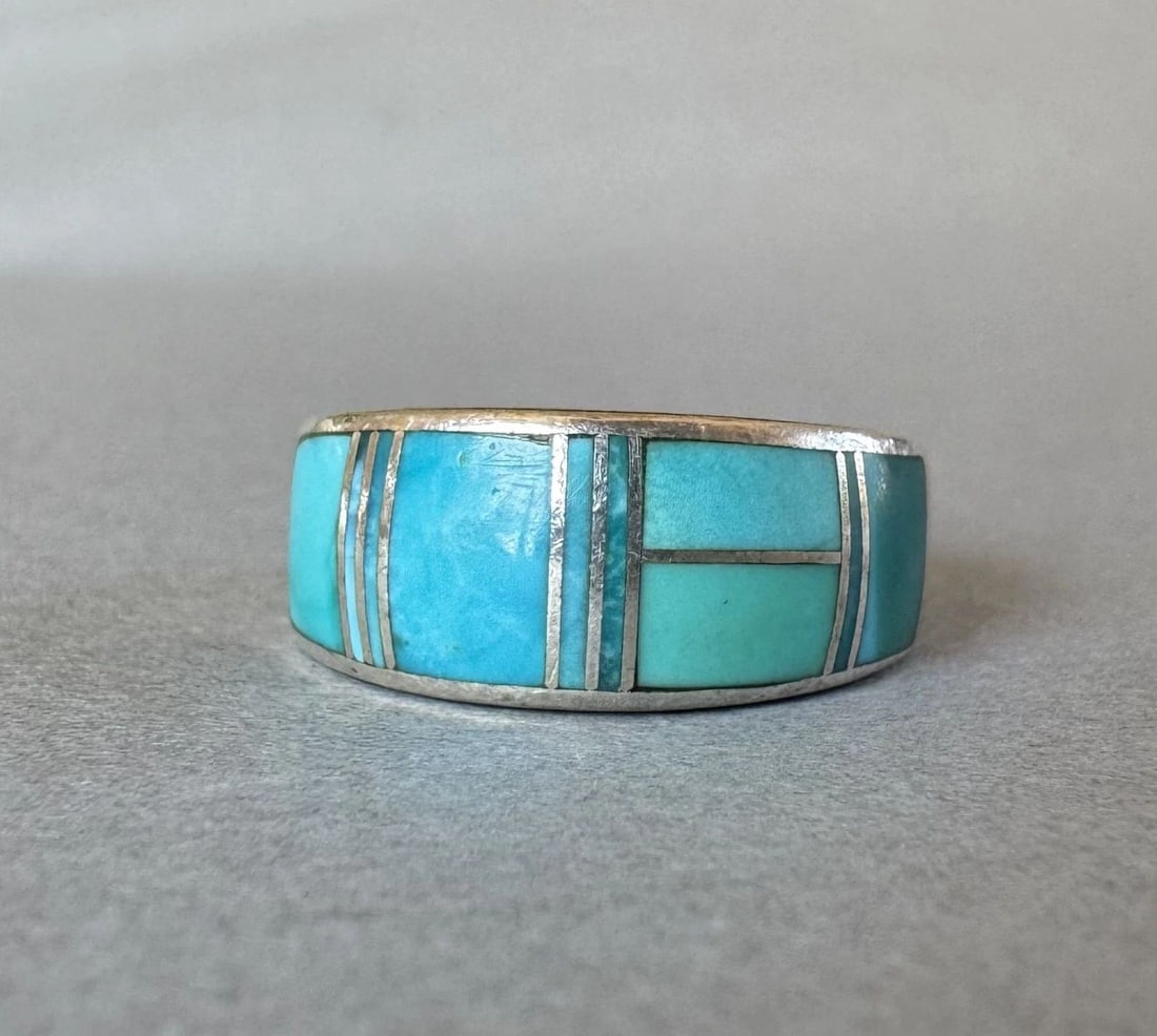 VINTAGE ZUNI STERLING SILVER AND TURQUOISE RING SIZE 6: 3/8 " wide Signed T 6 Grams Throughout the 40 years that I have been in business, I have purchased jewelry from pawn shops throughout the Southwest that had collections of dead pawn. Most of these paw