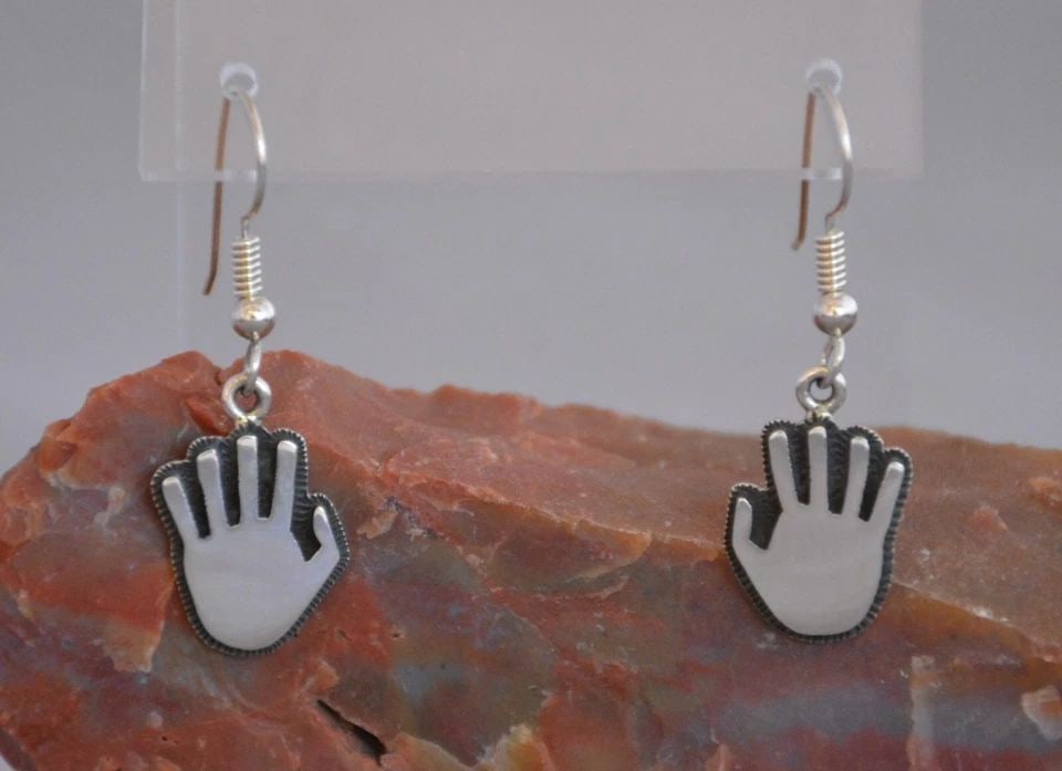 RAMON DALANGYAWMA - HOPI STERLING SILVER DANGLE EARRINGS - HANDS - 1.5" DROP: RAMON DALANGYAWMA - HOPI STERLING SILVER DANGLE EARRINGS - HANDS - 1.5" DROP This pair of sterling silver earrings have been beautifully crafted by Hopi silversmith Ramon Dalangyawma (1954-). Ramon ha