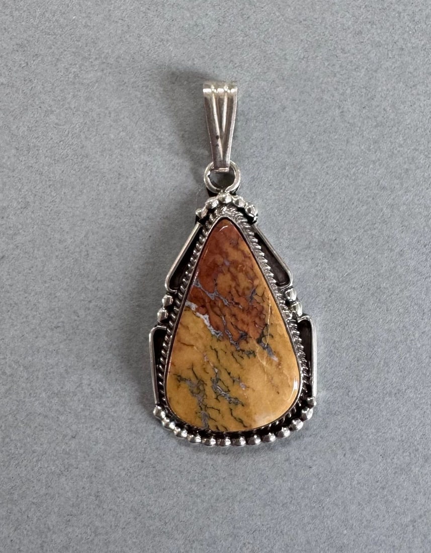 NAVAJO STERLING SILVER PENDANT PICTURE JASPER SIGNED JCY: 1 5/8 " Tall 6.5 Grams Signed JCY Throughout the 40 years that I have been in business, I have purchased jewelry from pawn shops throughout the Southwest that had collections of dead pawn. Most of the