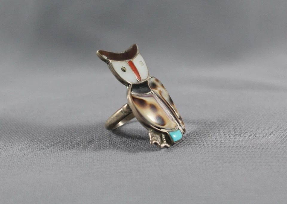 OLD PAWN ZUNI OWL RING INLAID STONES AND SHELLS SIZE 6: OLD PAWN ZUNI OWL RING INLAID STONES AND SHELLS SIZE 6 Item Description: 1 3/8” tall Needed a little black paint on one eye which I already fixed