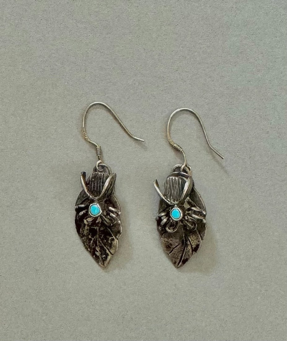 OLD PAWN NAVAJO STERLING SILVER AND TURQUOISE SPIDER EARRINGS: 1 1/2 " Drop ..5.7 Grams Throughout the 40 years that I have been in business, I have purchased jewelry from pawn shops throughout the Southwest that had collections of dead pawn. Most of these pawn s