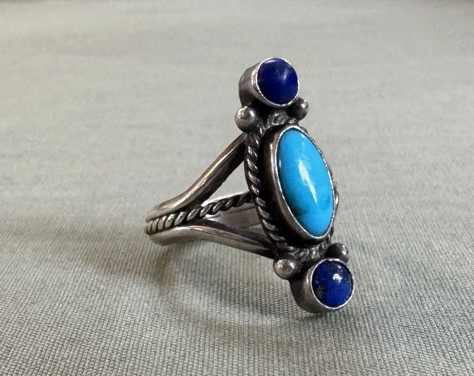 VINTAGE LAPAS AND TURQUOISE STERLING SILVER RING SIZE 6 1/2: VINTAGE LAPAS AND TURQUOISE STERLING SILVER RING SIZE 6 1/2 7/8" tall .. 5.4 Grams 6 1/2 Ring Size Throughout the 40 years that I have been in business, I have purchased jewelry from pawn shops throug