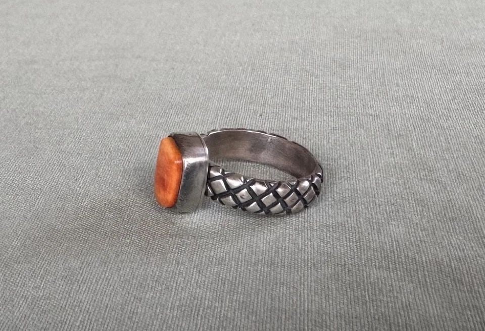 NAVAJO STERLING SILVER AND ORANGE CORAL RING SIGNED CORTEZ SIZE 6: NAVAJO STERLING SILVER AND ORANGE CORAL RING SIGNED CORTEZ SIZE 6 3/8" Wide .. 5 Grams Throughout the 40 years that I have been in business, I have purchased jewelry from pawn shops throughout the Sou
