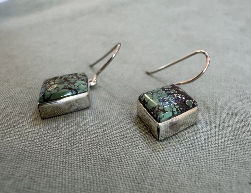 NAVAJO STERLING SILVER AND TURQUOISE EARRINGS SIGNED 1" DROP: NAVAJO STERLING SILVER AND TURQUOISE EARRINGS SIGNED 1" DROP 1/2 " Wide ..3.8 Grams Throughout the 40 years that I have been in business, I have purchased jewelry from pawn shops throughout the Southw