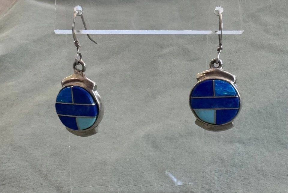 NAVAJO STERLING SILVER MULTI STONE INLAY EARRINGS SIGNED 1 3/8" DROP: NAVAJO STERLING SILVER MULTI STONE INLAY EARRINGS SIGNED 1 3/8" DROP 5/8" wide 7.6 Grams Throughout the 40 years that I have been in business, I have purchased jewelry from pawn shops throughout the S