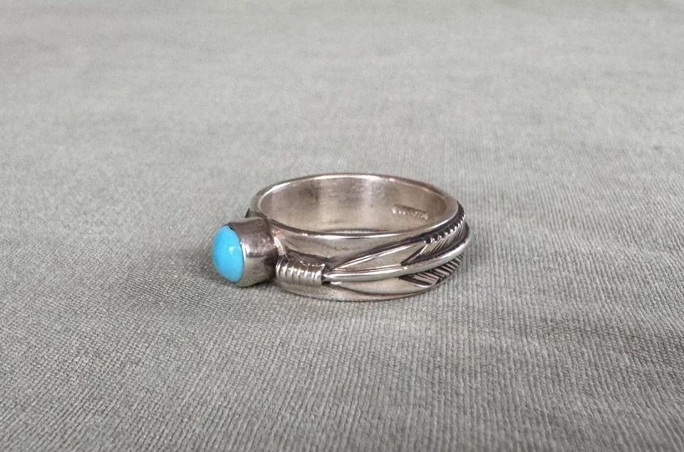 NAVAJO STERLING SILVER AND TURQUOISE RING SIGNED .. SIZE 6 1/4: NAVAJO STERLING SILVER AND TURQUOISE RING SIGNED .. SIZE 6 1/4 1/4" Wide .. Size 6 1/4 .. 6 grams Throughout the 40 years that I have been in business, I have purchased jewelry from pawn shops through