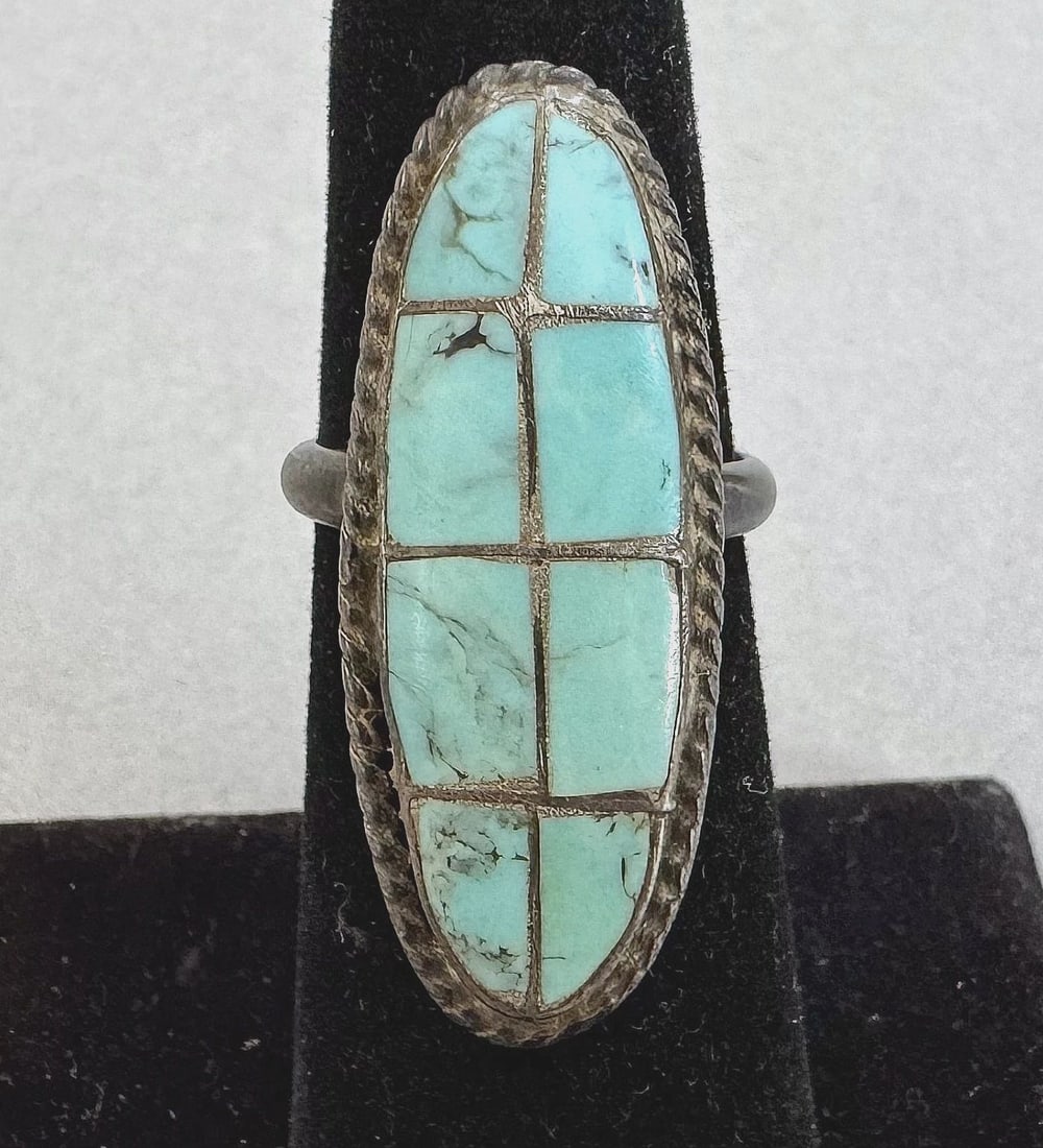 OLD PAWN ZUNI STERLING SILVER AND TURQUOISE RING SIZE 5 3/4: 1 1/4 " tall 6.6 Grams Throughout the 40 years that I have been in business, I have purchased jewelry from pawn shops throughout the Southwest that had collections of dead pawn. Most of these pawn sho