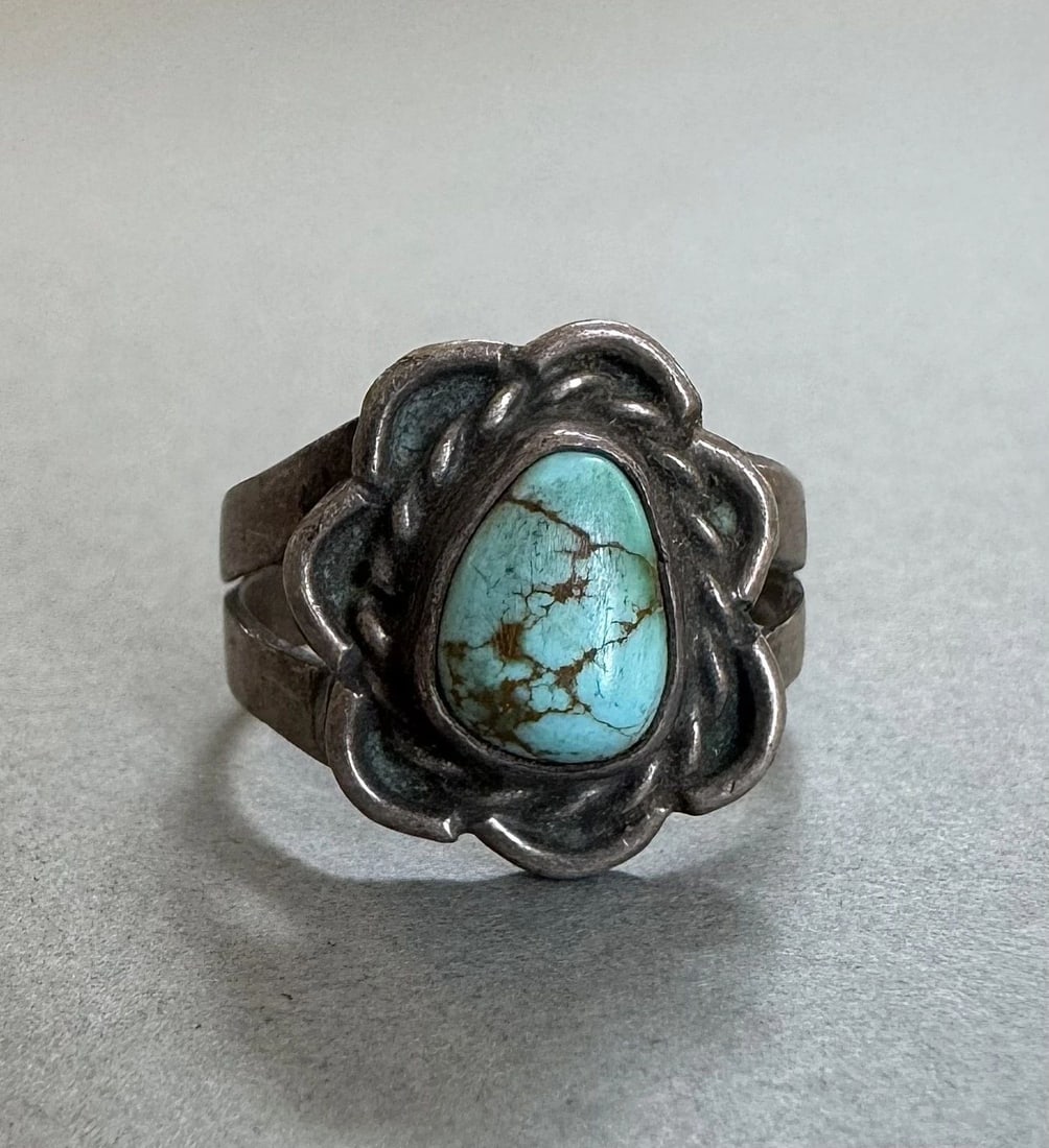 OLD PAWN NAVAJO STERLING SILVER AND TURQUOISE RING SIZE 6: 1/2 " Tall 3.8 Grams Throughout the 40 years that I have been in business, I have purchased jewelry from pawn shops throughout the Southwest that had collections of dead pawn. Most of these pawn shops