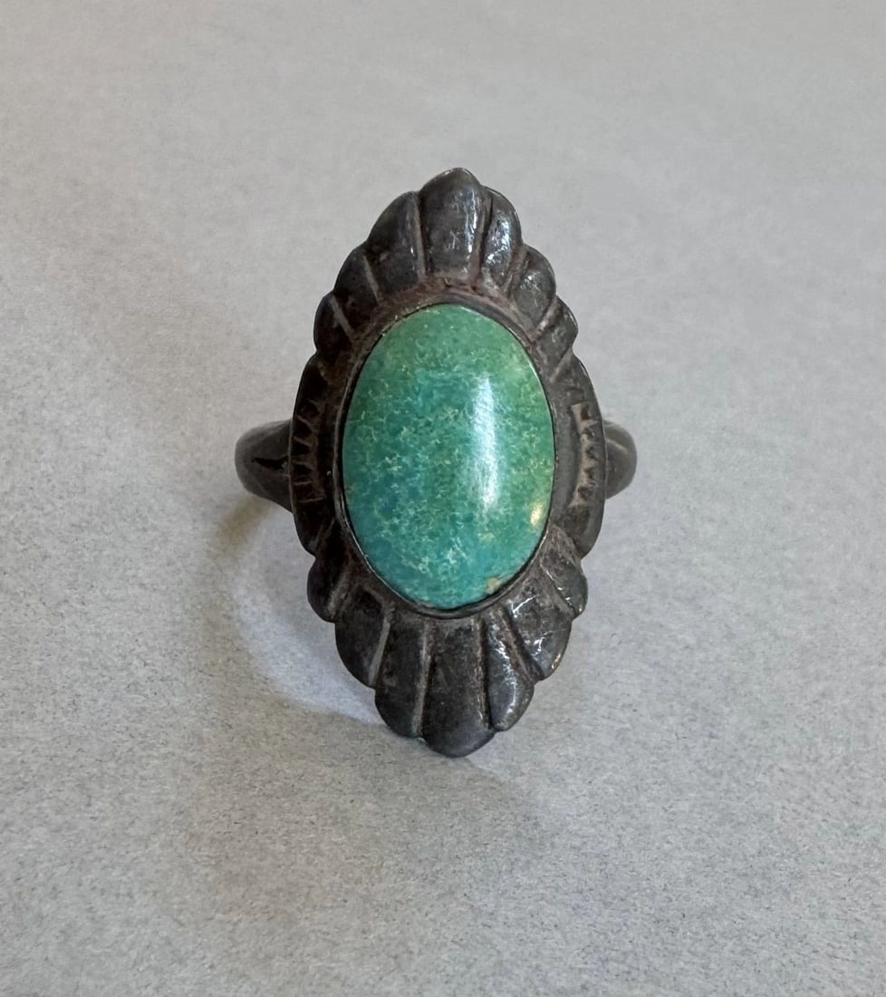 OLD PAWN NAVAJO STERLING TURQUOISE RING SIZE 5 1/4: 1" Tall 5.7 Grams Throughout the 40 years that I have been in business, I have purchased jewelry from pawn shops throughout the Southwest that had collections of dead pawn. Most of these pawn shops an
