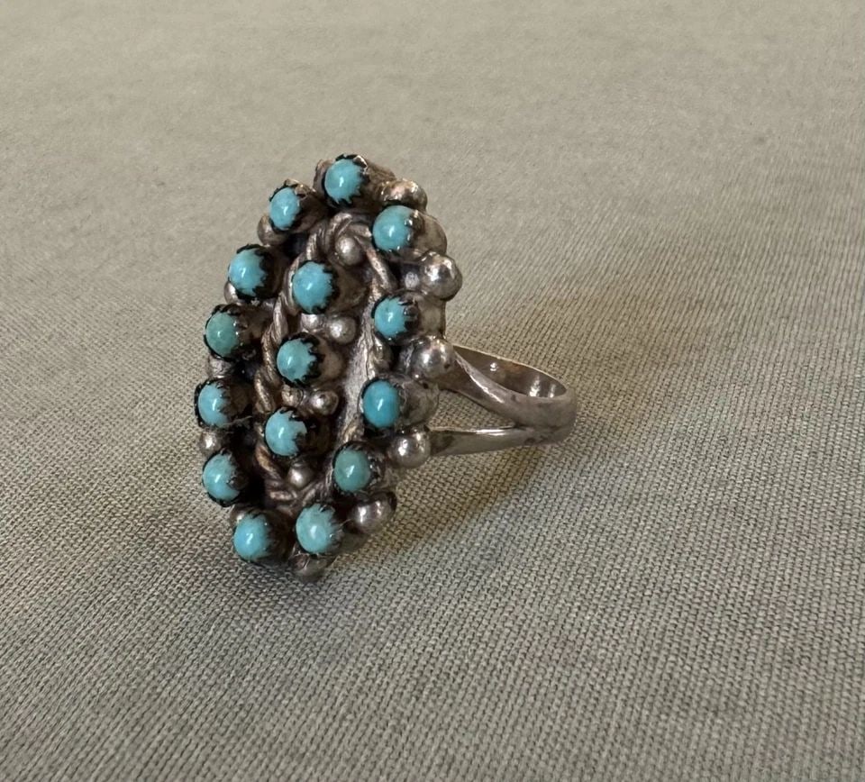 OLD PAWN ZUNI STERLING SILVER AND TURQUOISE RING SIZE 5 3/4: OLD PAWN ZUNI STERLING SILVER AND TURQUOISE RING SIZE 5 3/4 7/8" Tall 4.2 Grams Throughout the 40 years that I have been in business, I have purchased jewelry from pawn shops throughout the Southwest 