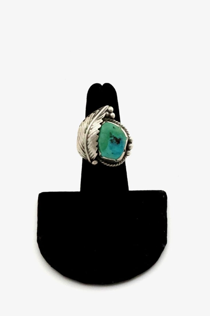 OLD PAWN NAVAJO STERLING SILVER AND TURQUOISE RING SIZE 5: 1 " Tall 8 Grams Throughout the 40 years that I have been in business, I have purchased jewelry from pawn shops throughout the Southwest that had collections of dead pawn. Most of these pawn shops and