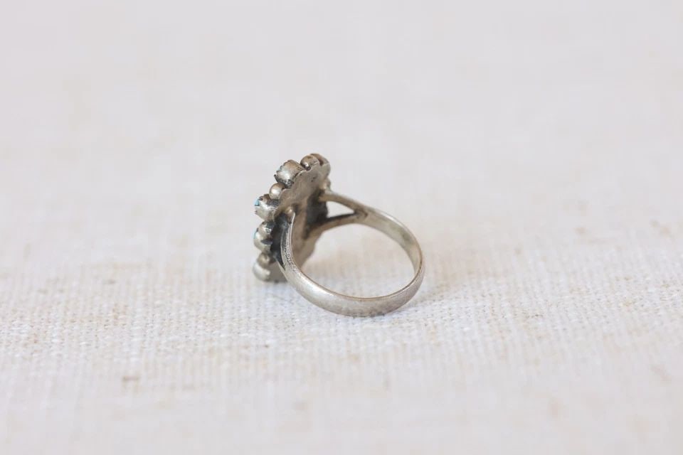 OLD PAWN STERLING SILVER AND TURQUOISE RING SIZE 6: OLD PAWN STERLING SILVER AND TURQUOISE RING SIZE 6 Older Zuni Sterling And Turquoise Ring Size 6 7/8" tall Throughout the 40 years that I have been in business, I have purchased jewelry from pawn shop