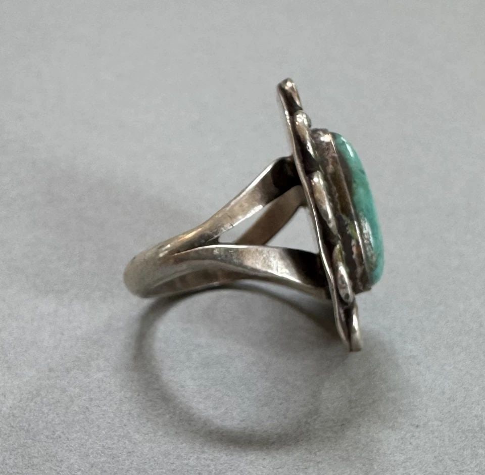 OLD PAWN NAVAJO STERLING SILVER AND TURQUOISE RING SIZE 6: 1" Tall 7.33 Grams Throughout the 40 years that I have been in business, I have purchased jewelry from pawn shops throughout the Southwest that had collections of dead pawn. Most of these pawn shops a