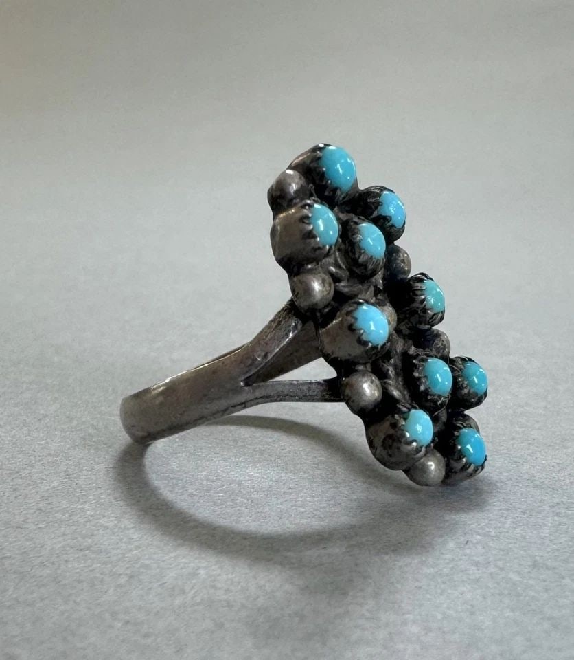 OLD PAWN ZUNI STERLING SILVER AND TURQUOISE RING SIZE 5 1/2: 3/4 " Tall 3.8 Grams Throughout the 40 years that I have been in business, I have purchased jewelry from pawn shops throughout the Southwest that had collections of dead pawn. Most of these pawn shops