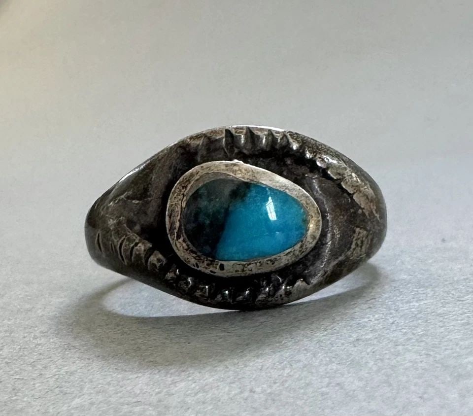 OLD PAWN NAVAJO STERLING SILVER AND TURQUOISE RING SIZE 6: 3/8 " Wide 4.5 Grams Throughout the 40 years that I have been in business, I have purchased jewelry from pawn shops throughout the Southwest that had collections of dead pawn. Most of these pawn shops
