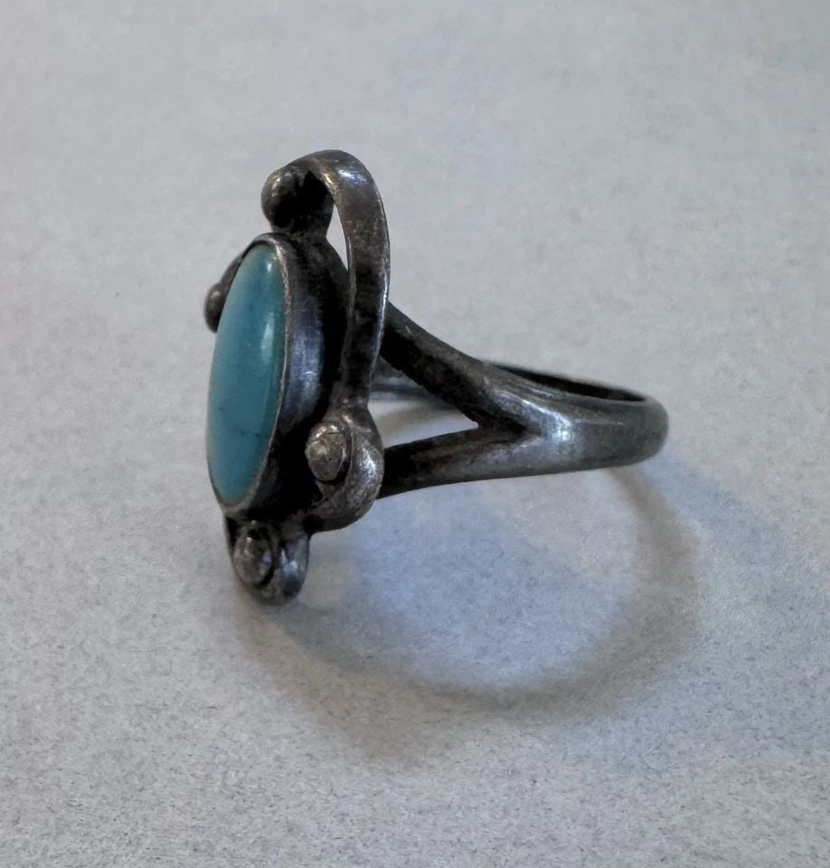 OLD PAWN NAVAJO STERLING SILVER TURQUOISE RING SIZE 5 3/4: 3/4 " Tall 4.7 Grams Throughout the 40 years that I have been in business, I have purchased jewelry from pawn shops throughout the Southwest that had collections of dead pawn. Most of these pawn shops