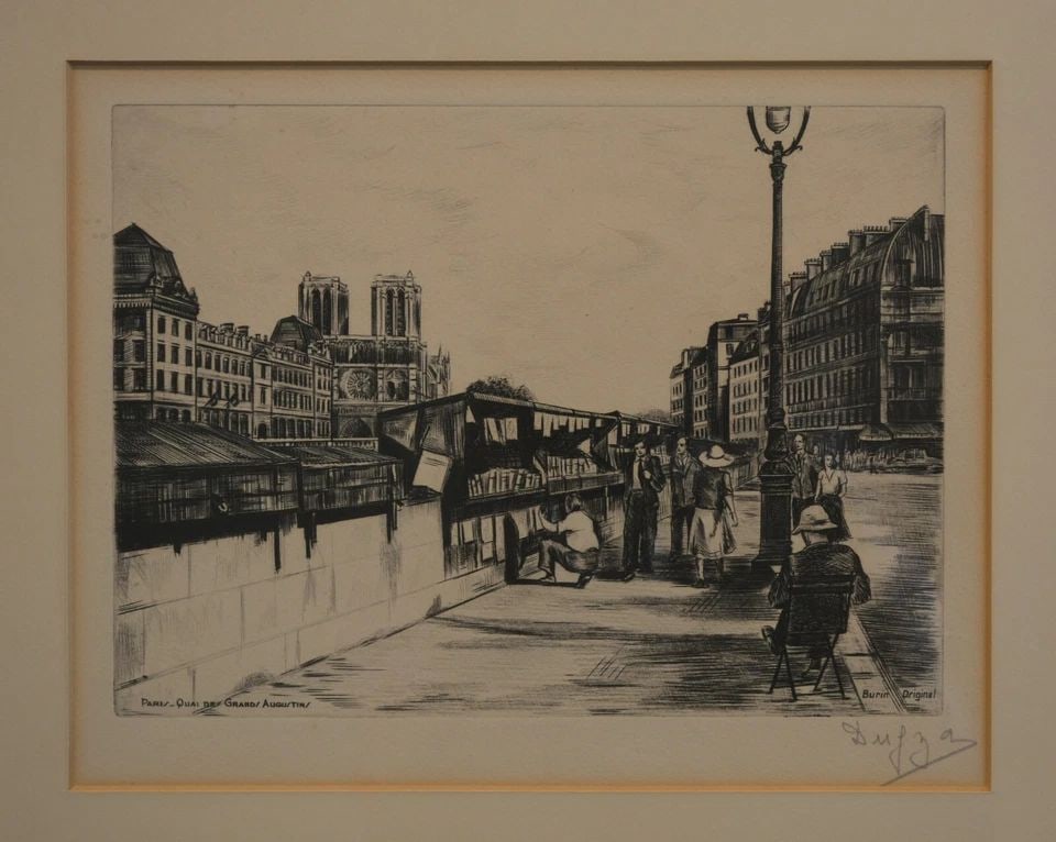 VINTAGE FRAMED ETCHING PARIS BOOKSTALL SEINE QUAI DES GRANDES AUGUSTINS - DUFZA: VINTAGE FRAMED ETCHING PARIS BOOKSTALL SEINE QUAI DES GRANDES AUGUSTINS - DUFZA Item Description: This etching shows a classic Paris bookstall on the Seine River. The Notre Dame Cathedral can be seen 