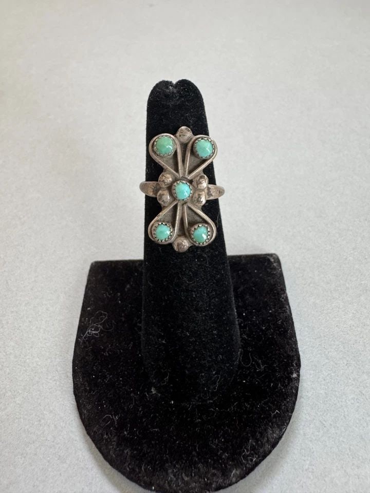 OLD PAWN ZUNI STERLING SILVER AND TURQUOISE RING SIZE 4 3/4: 7/8 " Tall 4 Grams Throughout the 40 years that I have been in business, I have purchased jewelry from pawn shops throughout the Southwest that had collections of dead pawn. Most of these pawn shops a