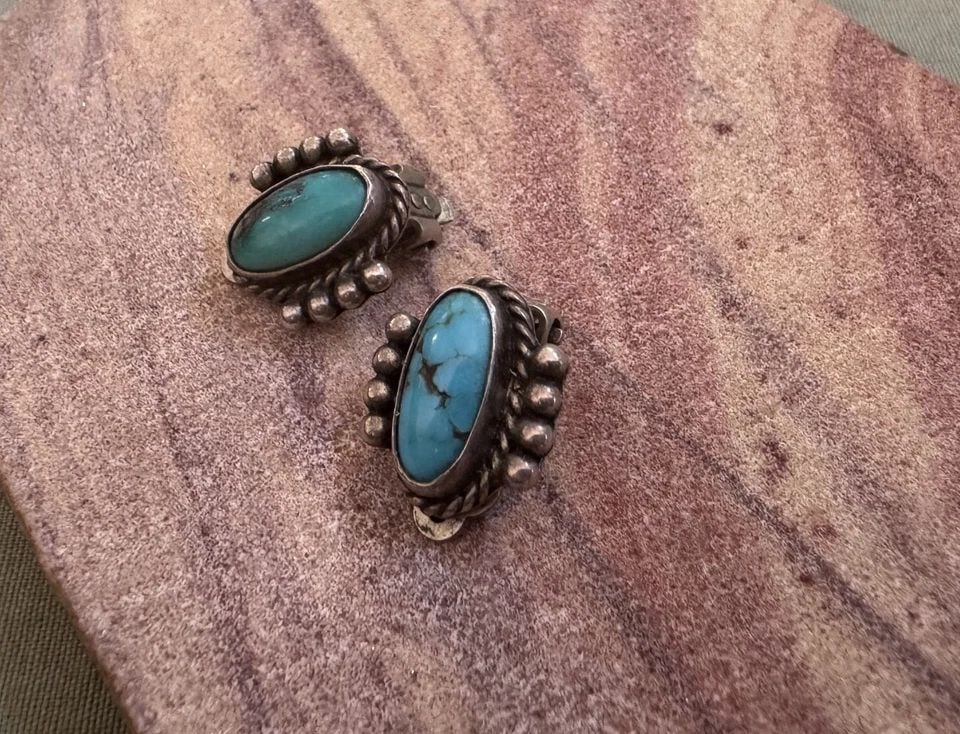 OLD PAWN NAVAJO STERLING SILVER AND TURQUOISE CLIP-ON EARRINGS: OLD PAWN NAVAJO STERLING SILVER AND TURQUOISE CLIP-ON EARRINGS 5/8" Tall Throughout the 40 years that I have been in business, I have purchased jewelry from pawn shops throughout the Southwest that ha