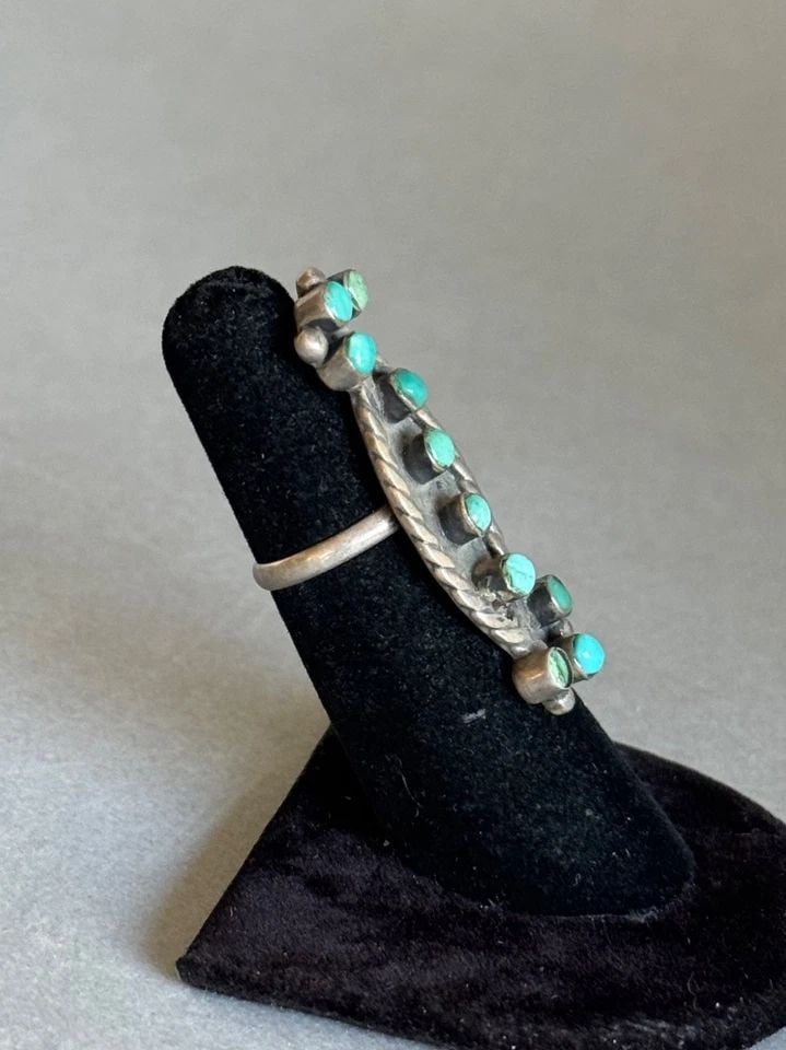 OLD PAWN ZUNI STERLING SILVER AND TURQUOISE RING 1 3/4?? TALL ..SIZE 4 3/4: OLD PAWN ZUNI STERLING SILVER AND TURQUOISE RING 1 3/4” TALL ..SIZE 4 3/4 Old Pawn Zuni Sterling Silver and Turquoise Ring Size 4 3/4 1 3/4” Tall couple stones are recessed ..