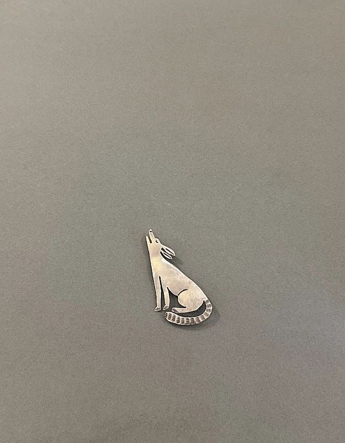 VINTAGE NAVAJO STERLING SILVER COYOTE PIN SIGNED DR: 2 1/2 " Tall 6 Grams Throughout the 40 years that I have been in business, I have purchased jewelry from pawn shops throughout the Southwest that had collections of dead pawn. Most of these pawn shops