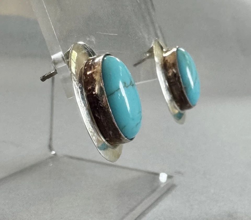 NAVAJO STERLING SILVER AND TURQUOISE EARRINGS: 3/4 " Tall 3.8 Grams Throughout the 40 years that I have been in business, I have purchased jewelry from pawn shops throughout the Southwest that had collections of dead pawn. Most of these pawn shops