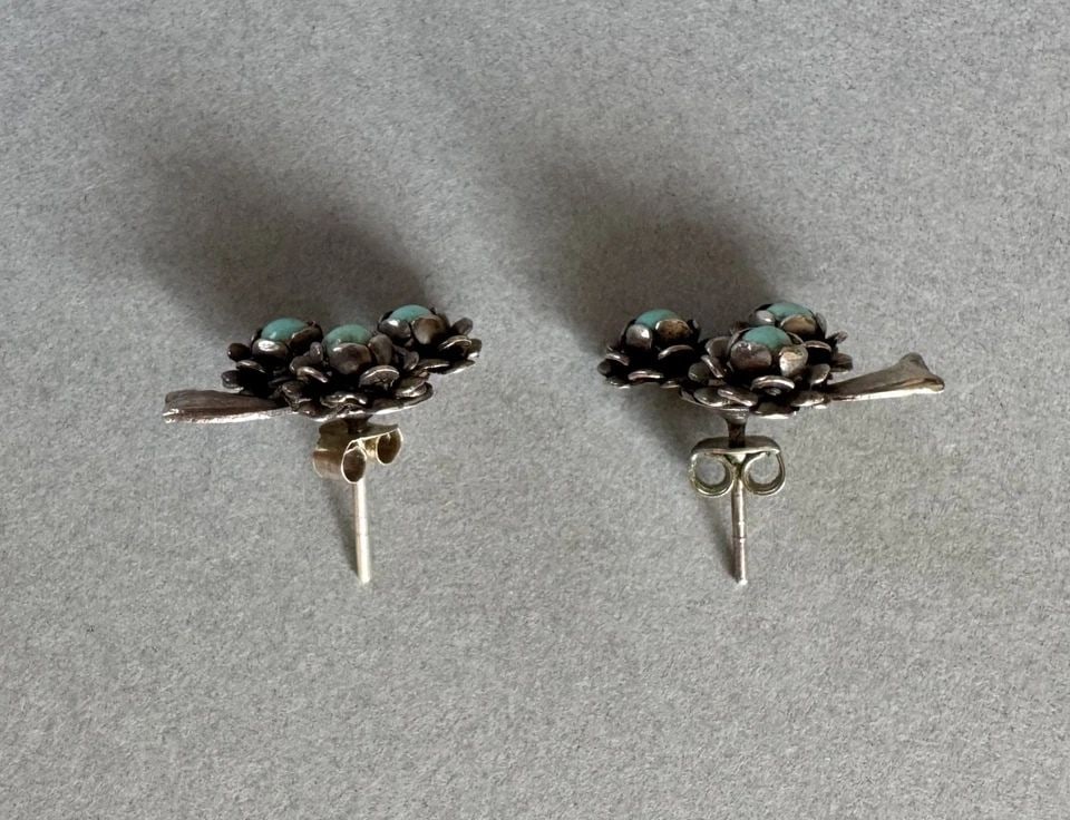OLD PAWN NAVAJO STERLING SILVER TURQUOISE EARRINGS: 1/2 " x 5/8 " 3.9 Grams Throughout the 40 years that I have been in business, I have purchased jewelry from pawn shops throughout the Southwest that had collections of dead pawn. Most of these pawn sh