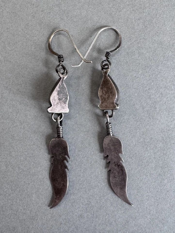 VINTAGE NAVAJO STERLING SILVER AND MOTHER OF PEARL EARRINGS 2 3/8 " DROP: 2 3/8 " Drop 3.4 Grams Throughout the 40 years that I have been in business, I have purchased jewelry from pawn shops throughout the Southwest that had collections of dead pawn. Most of these pawn sho