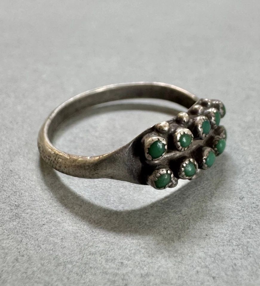 OLD PAWN ZUNI STERLING SILVER AND TURQUOISE RING SIZE 5 1/2: 1/4 " Wide 1.75 Grams Throughout the 40 years that I have been in business, I have purchased jewelry from pawn shops throughout the Southwest that had collections of dead pawn. Most of these pawn shop