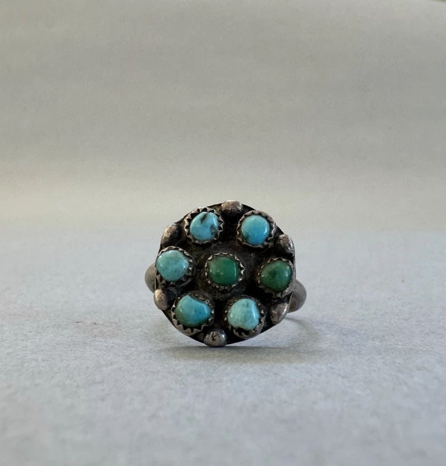 OLD PAWN ZUNI STERLING SILVER AND TURQUOISE RING SIZE 4 1/4: 1/2 " tall 2 Grams Throughout the 40 years that I have been in business, I have purchased jewelry from pawn shops throughout the Southwest that had collections of dead pawn. Most of these pawn shops a