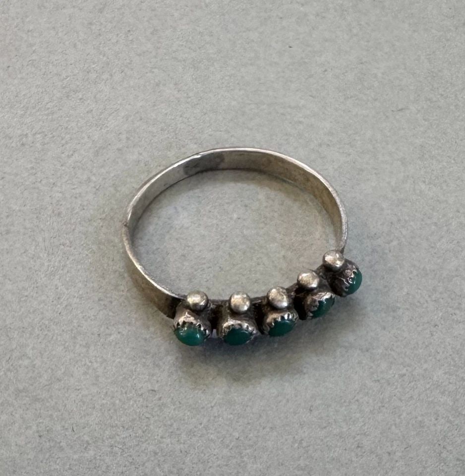 OLD PAWN ZUNI STERLING SILVER AND TURQUOISE RING SIZE 6: 3 /16 " Wide 1.5 Grams Throughout the 40 years that I have been in business, I have purchased jewelry from pawn shops throughout the Southwest that had collections of dead pawn. Most of these pawn sho