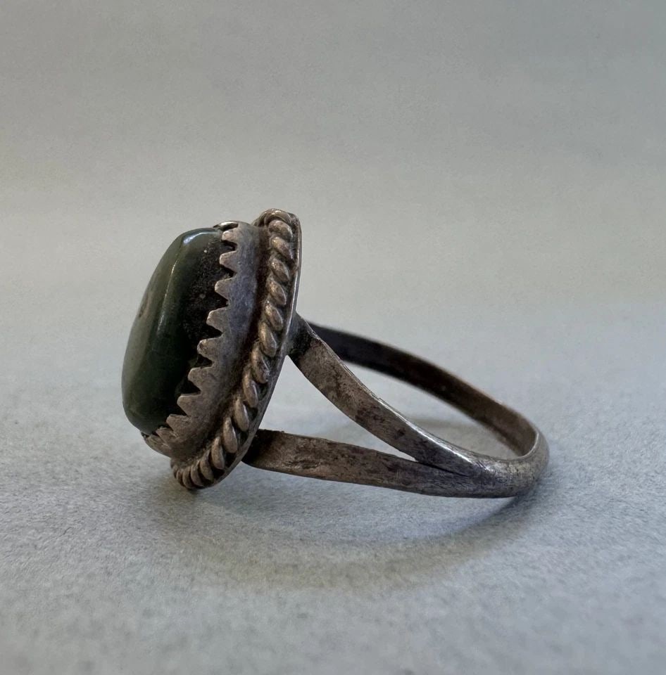OLD PAWN NAVAJO STERLING SILVER AND TURQUOISE RING SIZE 5 1/2: 1/2 " Tall 2.5 Grams Throughout the 40 years that I have been in business, I have purchased jewelry from pawn shops throughout the Southwest that had collections of dead pawn. Most of these pawn shops