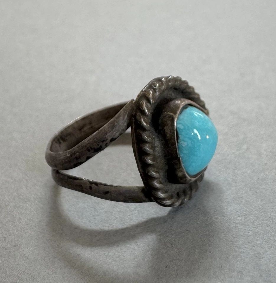 OLD PAWN NAVAJO STERLING SILVER TURQUOISE RING SIZE 5: 1/2 " Tall 4 Grams Throughout the 40 years that I have been in business, I have purchased jewelry from pawn shops throughout the Southwest that had collections of dead pawn. Most of these pawn shops a