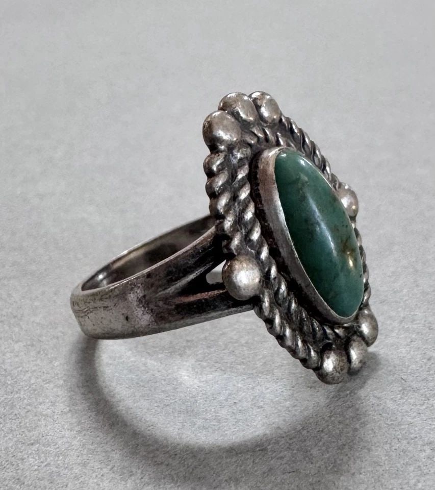 OLD PAWN NAVAJO STERLING SILVER TURQUOISE RING SIZE 5 1/4: 3/4 " Tall 4 grams Throughout the 40 years that I have been in business, I have purchased jewelry from pawn shops throughout the Southwest that had collections of dead pawn. Most of these pawn shops a