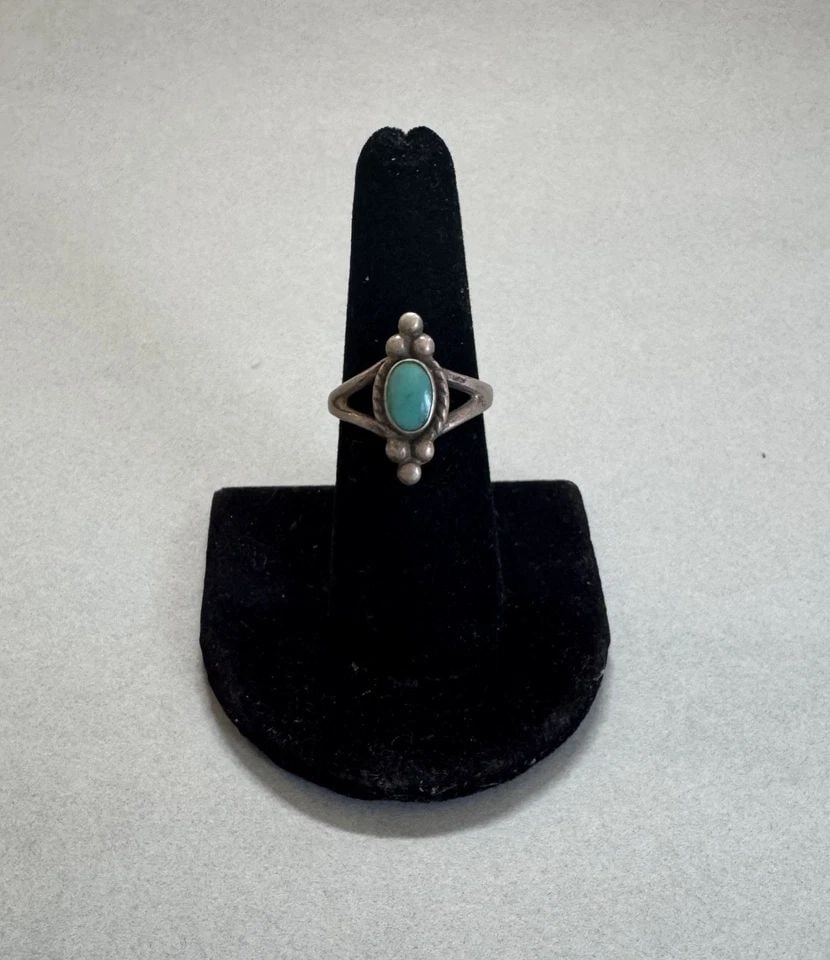 OLD PAWN NAVAJO STERLING SILVER TURQUOISE RING SIZE 7: 3/4 " Tall 3.8 Grams Throughout the 40 years that I have been in business, I have purchased jewelry from pawn shops throughout the Southwest that had collections of dead pawn. Most of these pawn shops