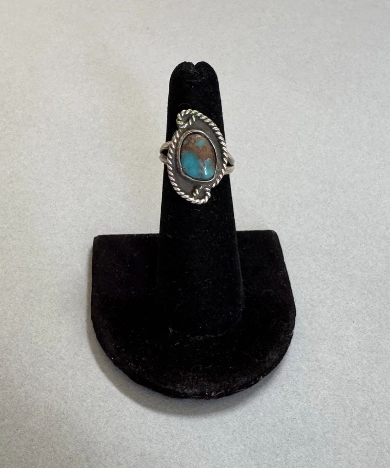 OLD PAWN NAVAJO STERLING SILVER TURQUOISE RING SIZE 5: 3/4 " Tall 5.15 grams Throughout the 40 years that I have been in business, I have purchased jewelry from pawn shops throughout the Southwest that had collections of dead pawn. Most of these pawn shop