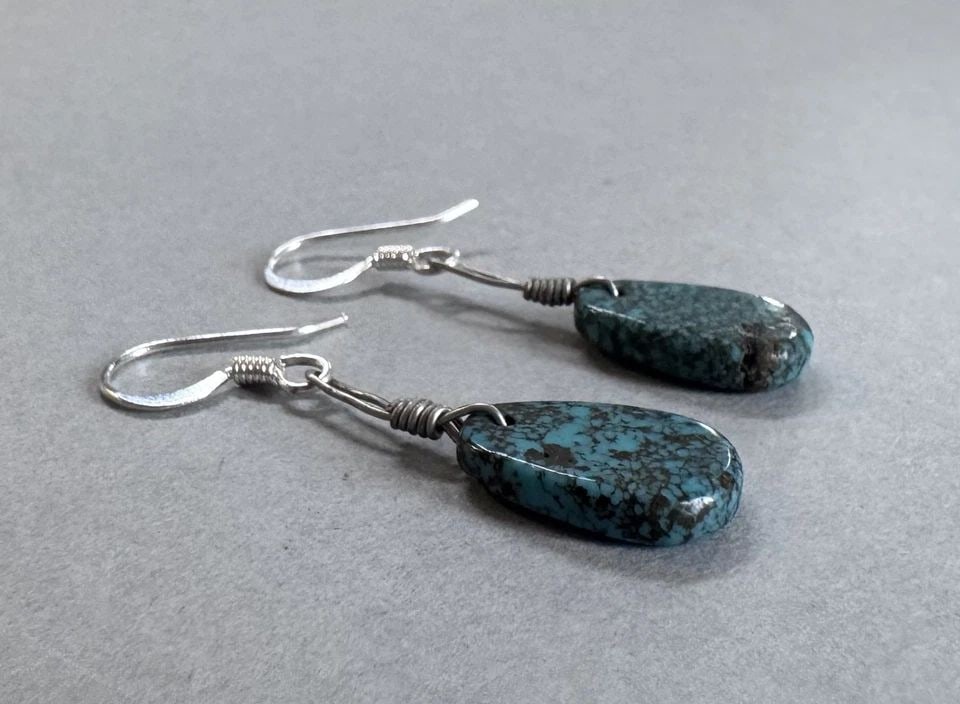 VINTAGE NAVAJO STERLING SILVER AND TURQUOISE TAB EARRINGS 1 3/8 " DROP: 1 3/8 " Drop ..turquoise 5/8 " 1.8 Grams Throughout the 40 years that I have been in business, I have purchased jewelry from pawn shops throughout the Southwest that had collections of dead pawn. Most