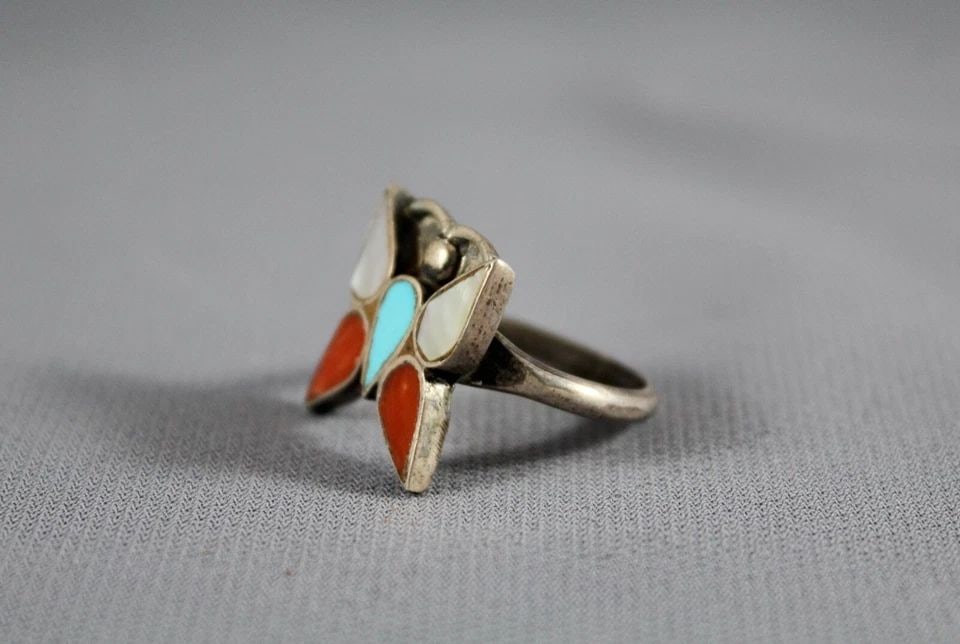 OLD PAWN NAVAJO INDIAN SILVER BUTTERFLY RING - TURQUOISE CORAL SHELL - SIZE 7: OLD PAWN NAVAJO INDIAN SILVER BUTTERFLY RING - TURQUOISE CORAL SHELL - SIZE 7 Item Description: This vintage Navajo ring has a butterfly inlaid with turquoise, white shell and coral. The front of the 