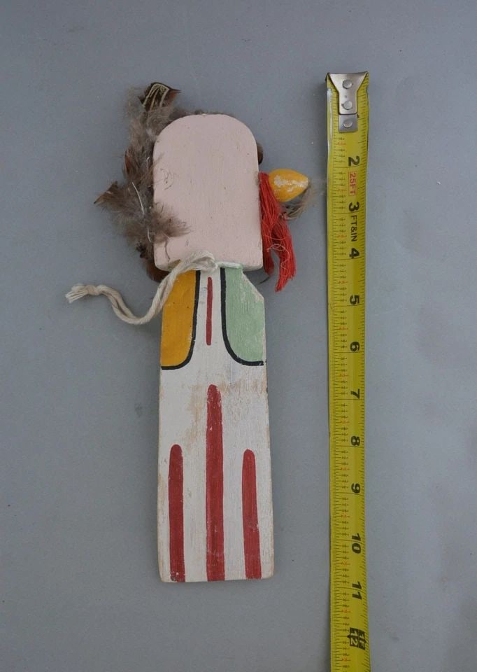 VINTAGE HOPI FLAT KACHINA DOLL - 9 1/2" TALL MISSING NOSE: VINTAGE HOPI FLAT KACHINA DOLL - 9 1/2" TALL MISSING NOSE Item Description: This vintage Hopi kachina doll is 9 1/2" tall not including the feathers. It is missing the nose /mouth.