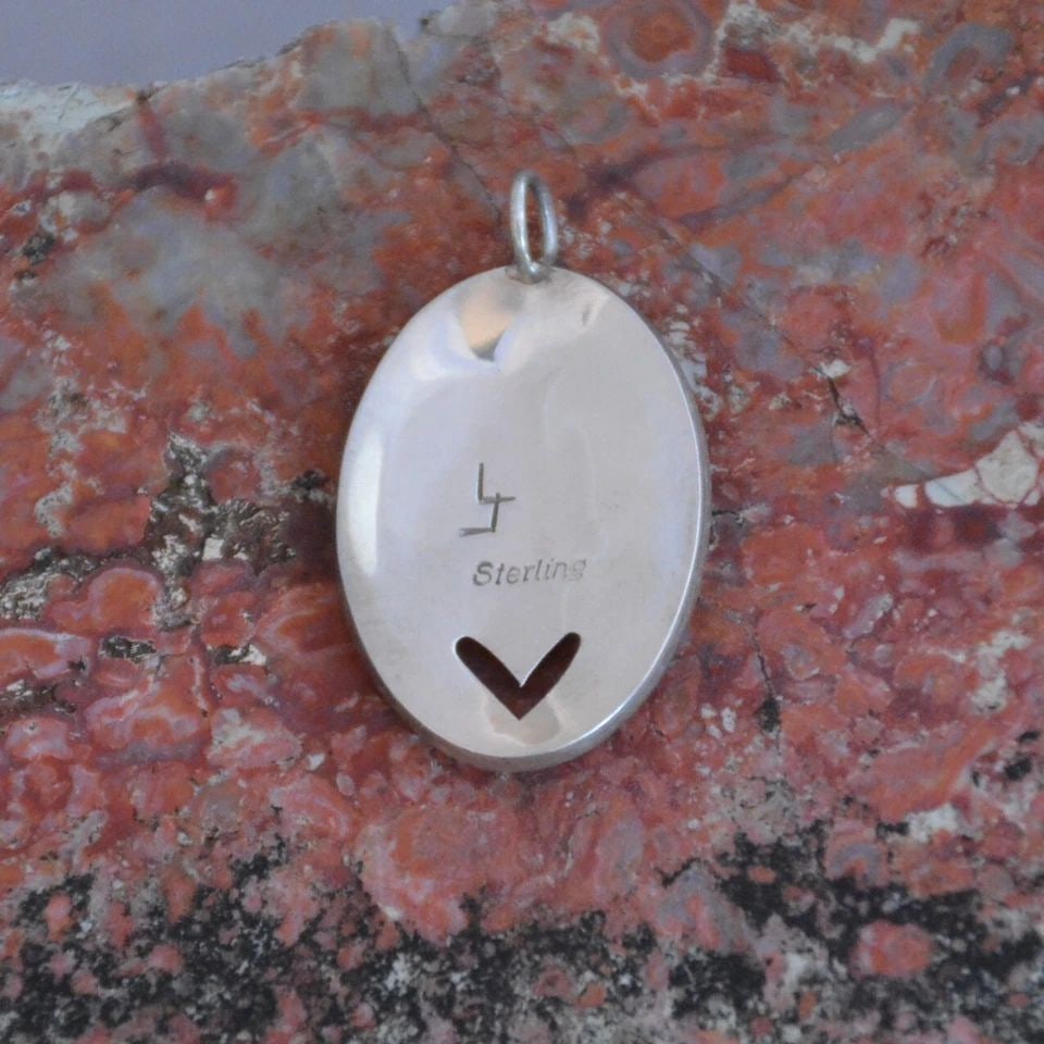 HOPI STERLING SILVER PENDANT - PAHO - PRAYER STICK WITH HEART - 1 1/8" TALL: HOPI STERLING SILVER PENDANT - PAHO - PRAYER STICK WITH HEART - 1 1/8" TALL This Hopi sterling silver pendant has been beautifully crafted. It shows a Paho - or Hopi prayer stick with traditional Hopi