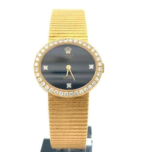 ROLEX CELLINI LADIES WATCH VINTAGE DIAMOND BEZEL 18K YELLOW GOLD: ROLEX CELLINI LADIES WATCH VINTAGE DIAMOND BEZEL 18K YELLOW GOLD Authentic from the Cellini Collection, this lovely vintage Rolex ladies wristwatch is crafted from 18k yellow gold featuring an oval sh