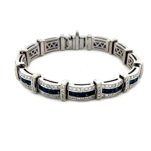 SAPPHIRE DIAMOND ESTATE GOLD BRACELET 18K WHITE CURVED BAR LINKS STYLE: SAPPHIRE DIAMOND ESTATE GOLD BRACELET 18K WHITE CURVED BAR LINKS STYLE This 18k white gold bracelet features beautiful, curved bar link with alternating slim cross bars, the curved bars have channel s