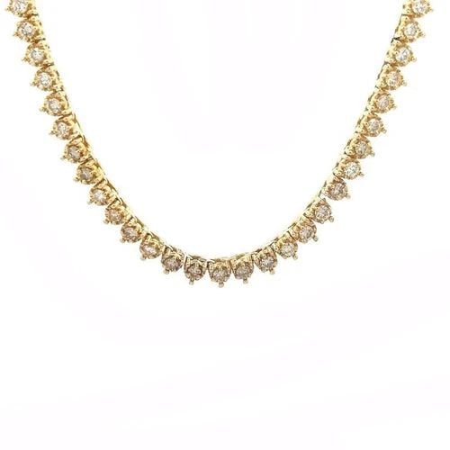 DIAMOND TENNIS NECKLACE 10K YELLOW GOLD 25" LONG 7CT: DIAMOND TENNIS NECKLACE 10K YELLOW GOLD 25" LONG 7CT This is a beautiful long tennis necklace; it is crafted from 10k yellow gold featuring an illusion set with 3 prongs on diamond and 3 prongs on the