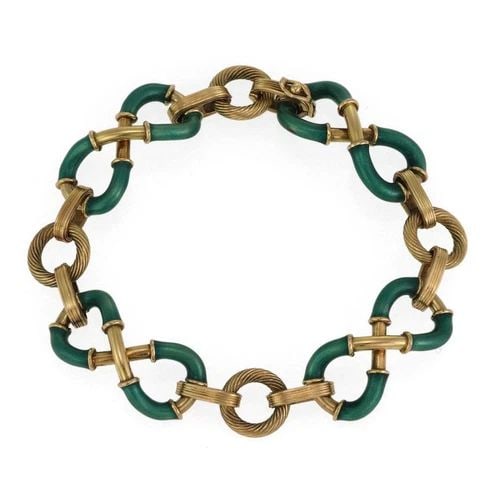 VINTAGE 18K YELLOW GOLD GREEN ENAMEL INFINITY LINK BRACELET LIQUIDATION: VINTAGE 18K YELLOW GOLD GREEN ENAMEL INFINITY LINK BRACELET Vintage 18k Yellow Gold Green Enamel Infinity Link Bracelet Description This is a lovely vintage bracelet, it is crafted from 18k yellow gol