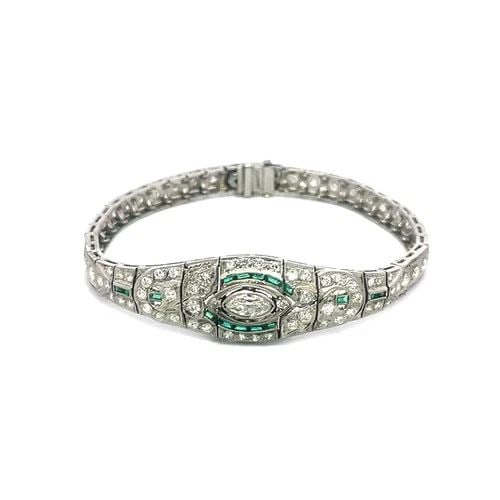 7496 DIAMOND PLATINUM BRACELET GEMSTONE FILIGREE MILGRAIN ART DECO: 7496 DIAMOND PLATINUM BRACELET GEMSTONE FILIGREE MILGRAIN ART DECO This lovely diamond and gold bracelet features intricate fine filigree design and a wide centerpiece with a large marquise diamond su