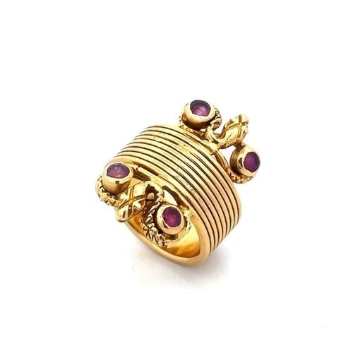 ILIAS LALAOUNIS RUBY GOLD SNAKE RING 18K YELLOW 9 ROWS BAND COILED SNAKES VINTGE: ILIAS LALAOUNIS RUBY GOLD SNAKE RING 18K YELLOW 9 ROWS BAND COILED SNAKES VINTGE This eye-catching authentic vintage ng from Lalaounis, it is crafted from 18k yellow gold featuring 9 wire band stacked