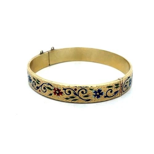 VINTAGE GOLD ENAMEL BRACELET 14K YELLOW WIDE HINGED FLORAL STYLE: VINTAGE GOLD ENAMEL BRACELET 14K YELLOW WIDE HINGED FLORAL STYLE This lovely vintage wide band hinged bracelet is crafted from 14k yellow gold featuring a 10mm wide band with push lock clasp. Around t