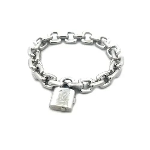 LOUIS VUITTON GOLD BRACELET 18K WHITE PADLOCK CHARM SQUARE LINK CHAIN: LOUIS VUITTON GOLD BRACELET 18K WHITE PADLOCK CHARM SQUARE LINK CHAIN This chic and fashionable bracelet is by Louis Vuitton; it is a luxurious piece of fine jewelry made of 18k white gold with sturdy