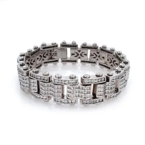 DIAMOND MEN'S BRACELET 14KT WHITE GOLD BAR LINK: DIAMOND MEN'S BRACELET 14KT WHITE GOLD BAR LINK This Diamond Men's Bracelet features a sleek design with 14kt white gold bar links that showcase channel-set round diamonds. The bracelet is 8 inches in
