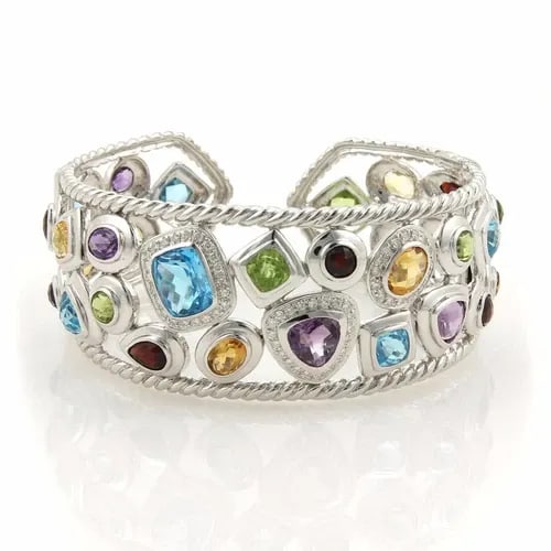 SOPHIA DIAMONDS GOLD BRACELET GEMSTONE 18K WHITE WIDE CUFF BRACELET: SOPHIA DIAMONDS GOLD BRACELET GEMSTONE 18K WHITE WIDE CUFF BRACELET The Sophia gold bracelet is a stunning piece of fine jewelry featuring a wide cuff design with a beautiful white gemstone as the mai